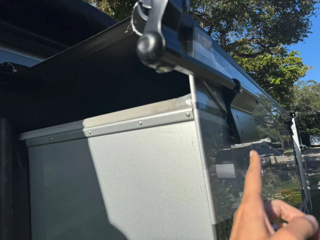 Broken RV awning bracket needing repair in Palm City FL