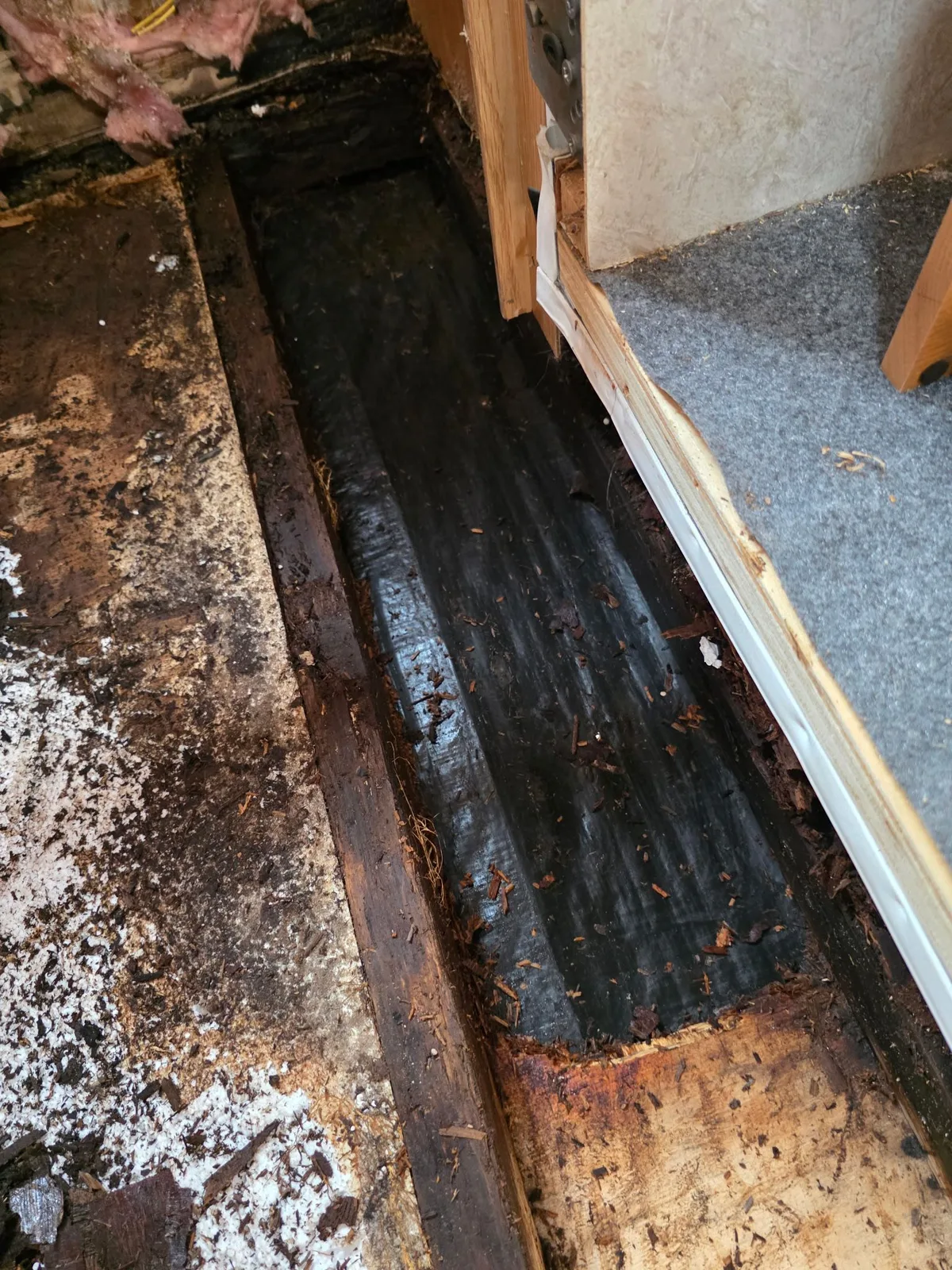 Damaged RV floor from water leak requiring replacement in Palm City Florida